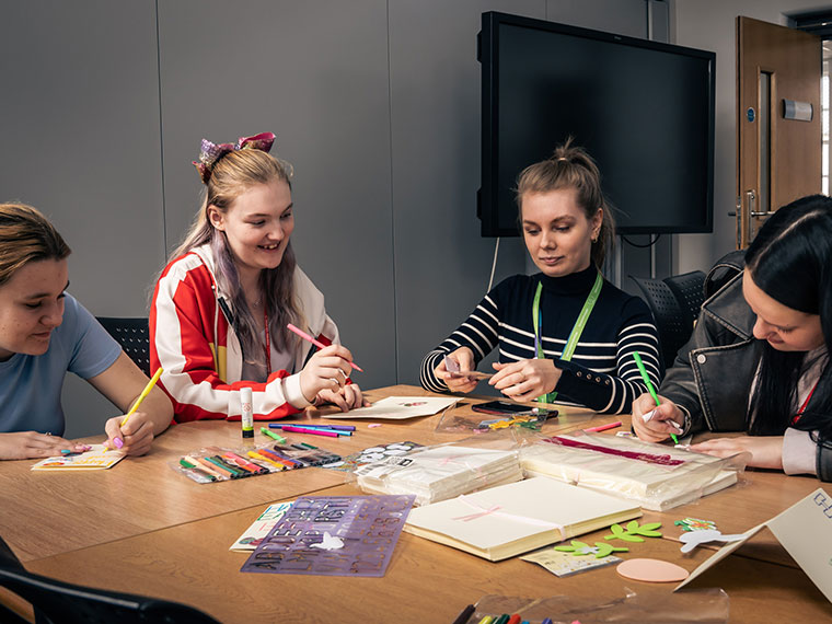 Students sat around a table